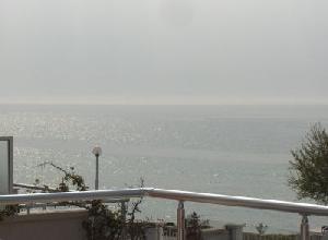 View from terrace to the sea and beach